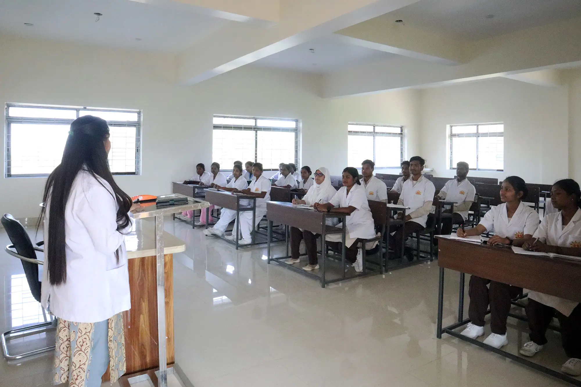Students in a technologically integrated lecture hall